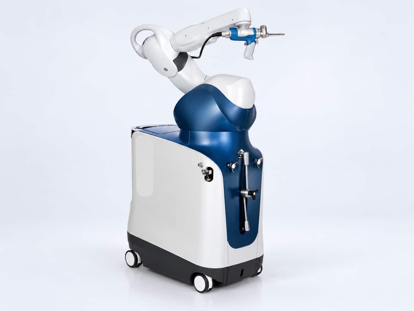Illustration of a classic Mako system, with a rounded white and teal cart and articulated robotic arm.